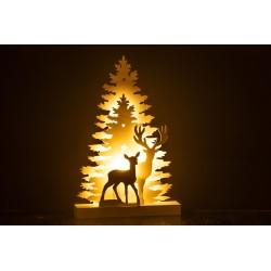 Décoration lumineuse en bois beige avec cerfs et arbres